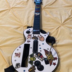 Nintendo White Guitar-Style Game Controller with Sticker Accents